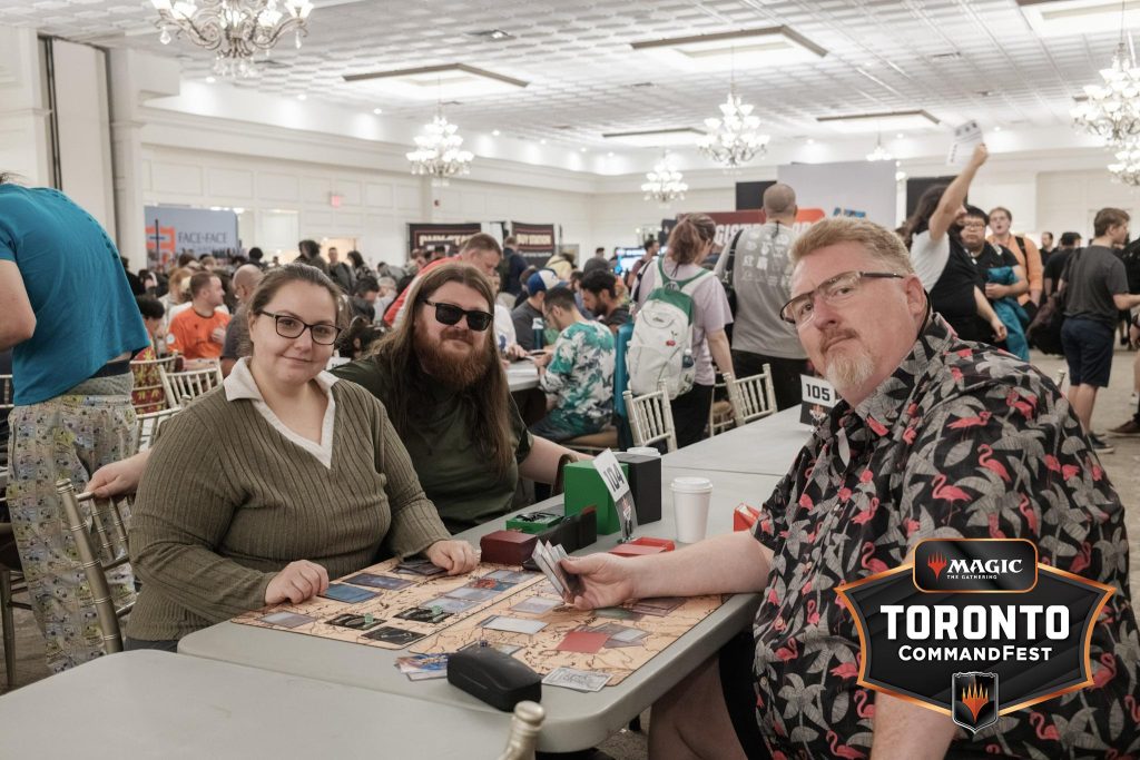 Friends at a full table at F2F Tour Toronto CommandFest 2026
