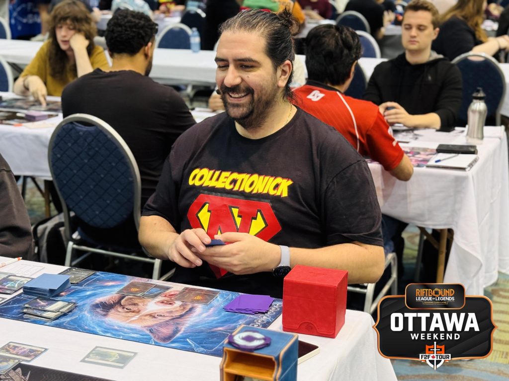 A smiling player during a match at the Riftbound Ottawa Weekend